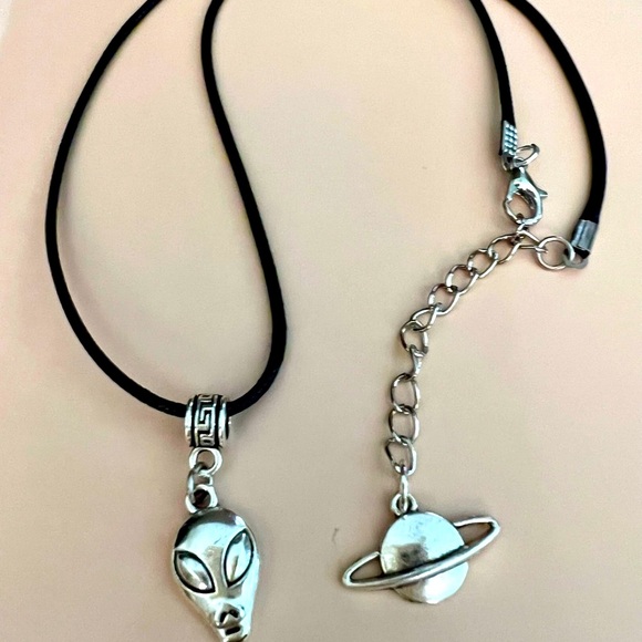 Planetary Visitor Alien Head Necklace on a Black Cord with Saturn Charm ending - Picture 3 of 10